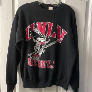 Vintage 1991 UNLV Rebels Black Crewneck Sweater with Bold Graphic Design size XL